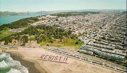 Thousands of Anti-Trump Protesters Gather on San Francisco Beach
