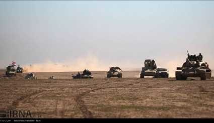 Iraqi army advanced toward the village of Sheikh Yunis in southern Mosul