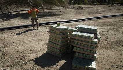 IRCS Workers Provide Humanitarian Aid for Flood-Hit Areas in Southern Iran