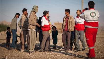 IRCS Workers Provide Humanitarian Aid for Flood-Hit Areas in Southern Iran