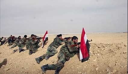 Syrian Army Soldiers Take Position near Palmyra