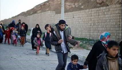 Displaced Citizens Continue to Flee Mosul as Security Forces Seize Key City Sites