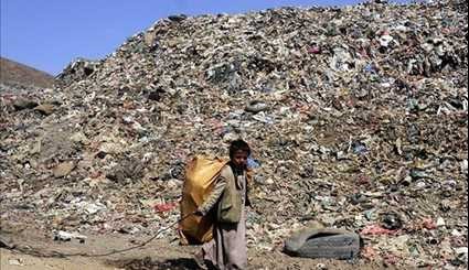 Children Search for Recyclable Items in Garbage Dump of Yemen