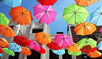 صور لمظلات تغطي شوارع البرتغال