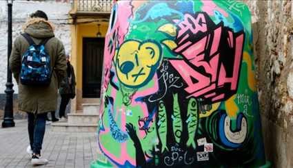 Street art revives divided Spanish village