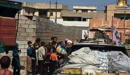 بالصور..إيصال الدعم اللوجستي من أهالي مدينة بلد العراقية للمقاتلين في خطوط المواجهة في الموصل