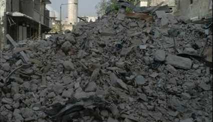 بالصور استمرار أعمال ترحيل الأنقاض في حلب