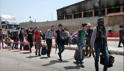 Syria: Hundreds of Gunmen, Family Members Evacuated from Homs