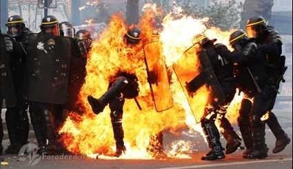 معارضون فرنسيون يحرقون رجال الشرطة