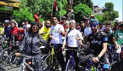 Syrians Take Part in Cycling Marathon to Mark Martyrs' Day in Damascus