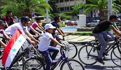Syrians Take Part in Cycling Marathon to Mark Martyrs' Day in Damascus