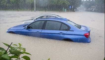 Rainstorms Cause Floods, Trap Cars in South China's Guangzhou