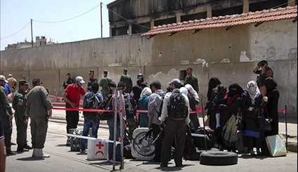 Homs: More Militants, Family Members Leave Al-Wa'er