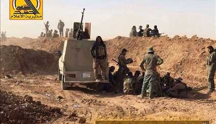 قوات الحشد الشعبي العراقي ترفع العبوات الناسفة وتطهر المنازل المفخخة جنوب ناحية القيروان
