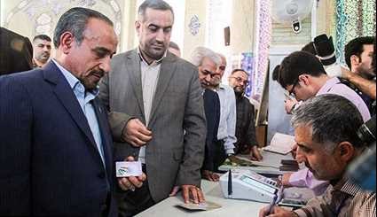 Iranians Queue up to Vote in Presidential & City Council Elections