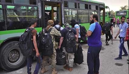 Tens of Gunmen, Family Members Evacuated from Northwestern Homs