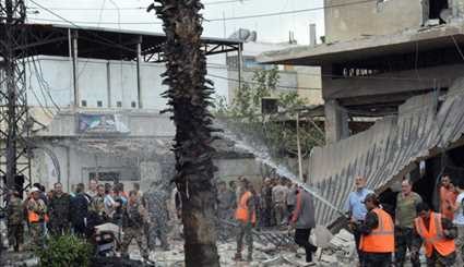 دمار ناجم عن تفجير إرهابي بسيارة مفخخة في ميدان 