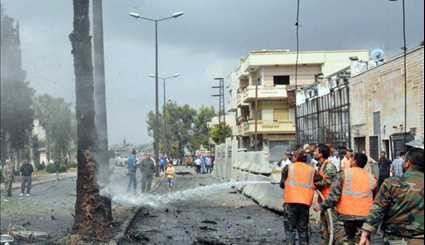 دمار ناجم عن تفجير إرهابي بسيارة مفخخة في ميدان 
