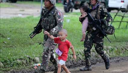 فرار فیلیپینی ها از دست داعش | تصاویر
