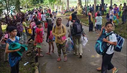 فرار فیلیپینی ها از دست داعش | تصاویر