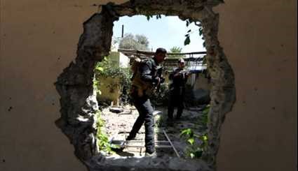 Iraqis Leave Zanjili Neighborhood as Security Forces Continue...