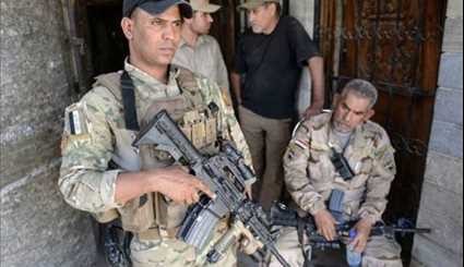 Iraqi Civilians Escorted to Safety as Army Continues Battle