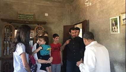 Assad Family Visit War Veteran in Hama