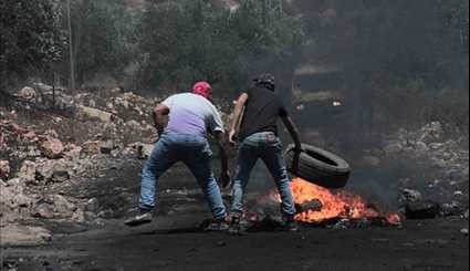 Palestinian Protesters Clash with Israeli Soldiers near West Bank City of Nablus