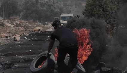 Palestinian Protesters Clash with Israeli Soldiers near West Bank City of Nablus