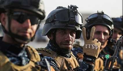 Iraqi Police Forces Celebrate as Mosul Battle Nears End
