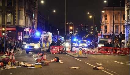 Riot Police on Streets of London as Protesters Set Fire to Barricades over Death of 20-Year-Old Rashan Charles