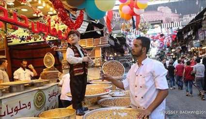 بالصور، افخرانواع الحلويات العربية في حي الميدان بدمشق