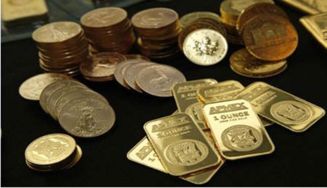 الذهب يتراجع مع هبوط اليورو قبيل قمة أوروبية