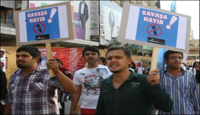محلل سياسي: الحرب ضد سوريا تنذر بحرب عالمية