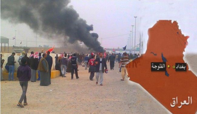 متظاهرو الفلوجة يحرقون برج مراقبة تابع للجيش