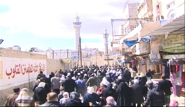 People of Damascus march on Zainab shrine