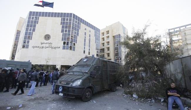 الشرطة تنسحب من بورسعيد وتسلمها للجيش