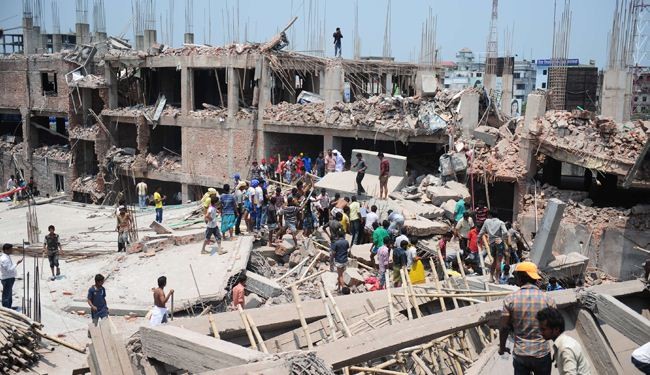 82 قتيلا و700 مصاب بانهيار مبنى في بنغلادش