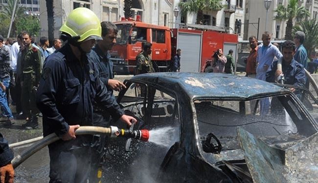 Damascus huge car bomb kills 13, wounds 70