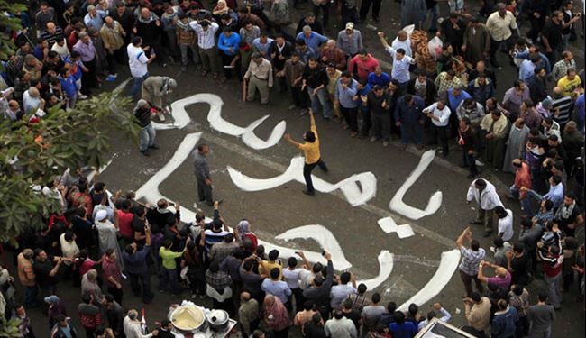 Egyptians march in Cairo; urge Pres. Morsi to quit
