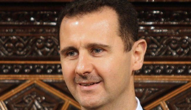 President Assad congratulates Rohani's victory