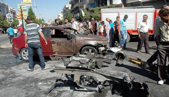 عشرات القتلى والجرحى بتفجيرين في حمص