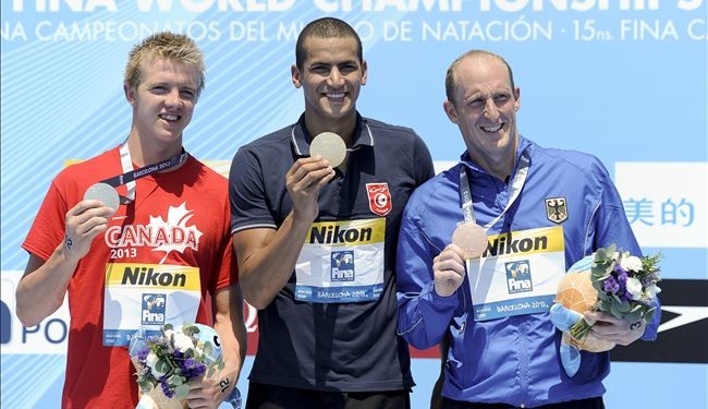 الملولي بطل العالم في سباق 5 كلم في السباحة