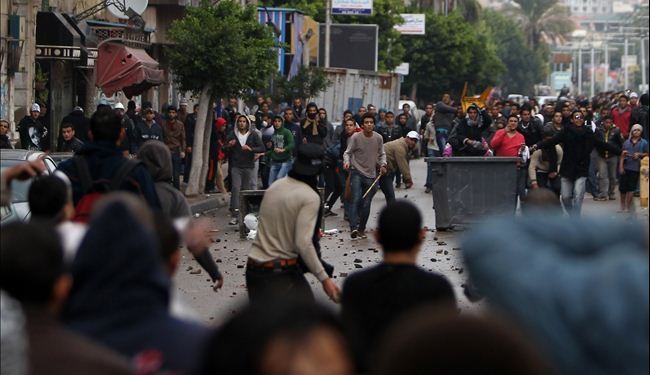 عشرات الجرحى باشتباكات بين انصار مرسي ومعارضيه