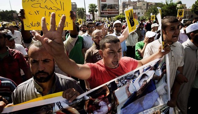 قتيل واصابات بين انصار مرسي في مواجهات مع الامن