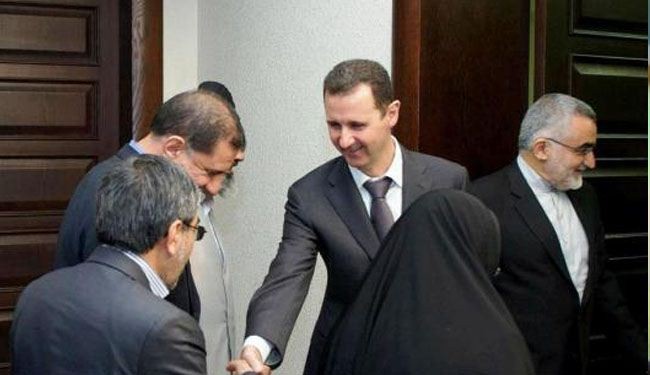 Iran MPs meet Assad, condemn attack on Syria