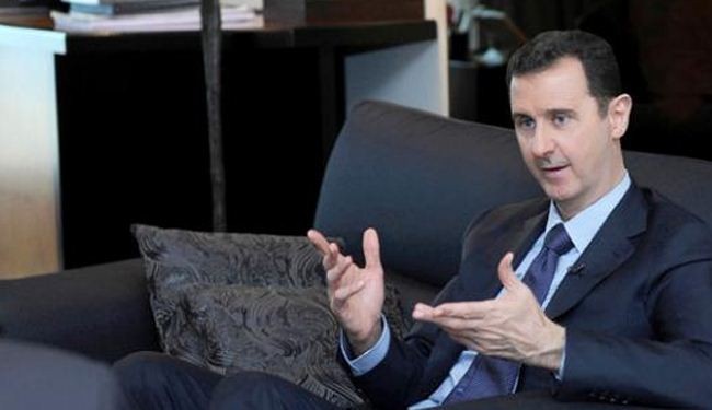 Assad warns France against military action on Syria