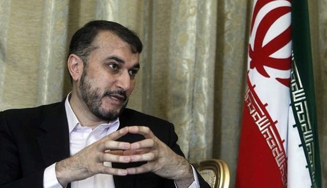 Iran urges end to arms flow into Syria
