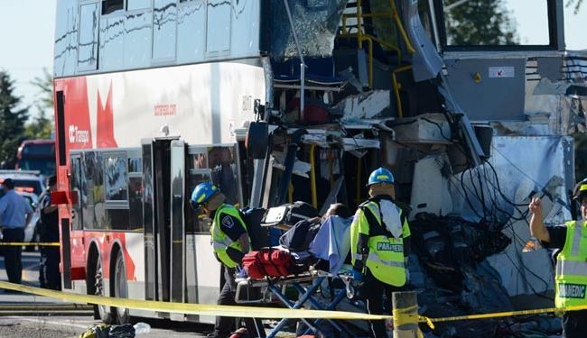 At least 5 dead in Canada bus, train crash