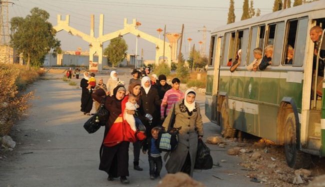 سورية... نقل ألفي طفل وامرأة إلى مراكز إقامة مؤقتة